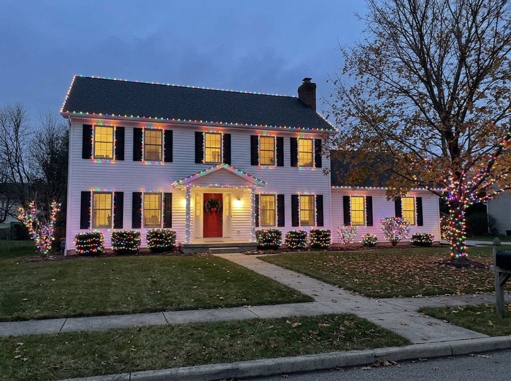 Same colonial house, multicolor lights